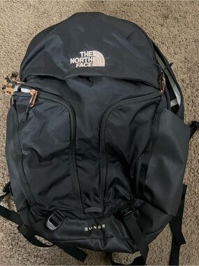 The North Face Black Backpack with Rose Gold Accents